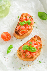 Delicious and fresh bruschetta with basil and tomato