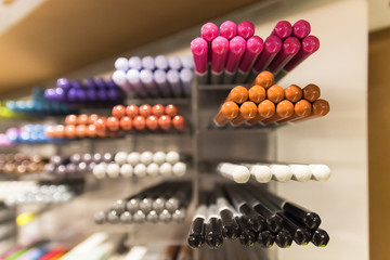 Multicolored pencil in art stationery store; art, workshop, inspiration, craft. Creativity concept large choice of different pencils for drawing. (selective focus)