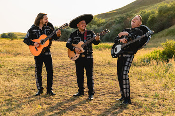 Mexican musicians mariachi outdoor. 