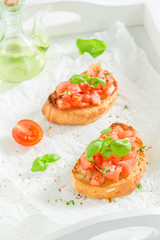 Crisp and fresh bruschetta with basil and tomato
