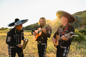 Mexican musicians mariachi outdoor. 