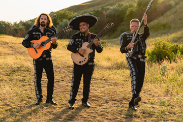 Mexican musicians mariachi outdoor. 