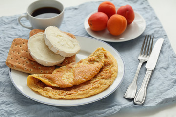 Breakfast with omelet and goat cheese