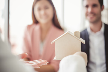 Seller presenting new home /house to business people, marketing for home, condominium and residence...