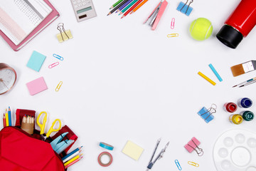 Stationeries and office supplies on white background. Flat lay. Top view with copy space. Back to school concept.