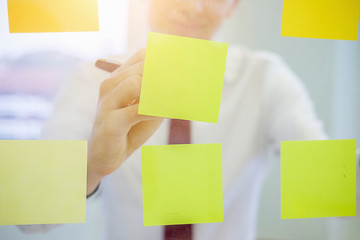 Start up partners are working in casual clothes, discussing the ideas for new strategy of development.