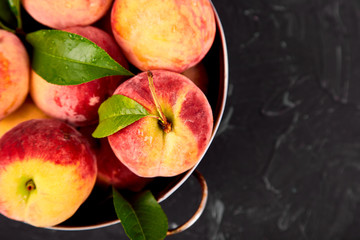 Ripe peaches in a bowl