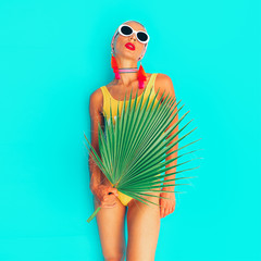 Beach Girl fashion tropical look. Stylish swimsuit and trendy accessories