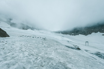 Fototapeta na wymiar View of a glacier with skiing infrastructure