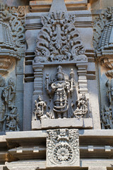 Fototapeta na wymiar Ornate wall panel reliefs depicting Lord Shiva, Chennakesava temple, Belur, Karnataka.