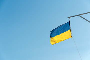 fluttering blue and yellow flag of Ukraine. Day of the Ukrainian Navy