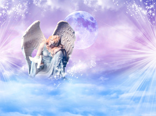 angel archangel Gabriel, Haniel, Ariel with mystical sky, rays of light with bird dove of peace and love 