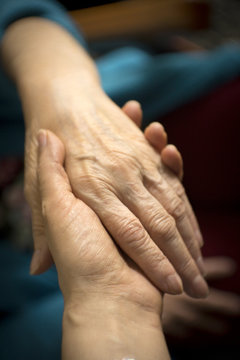 Hands of elderly woman with alzheimer