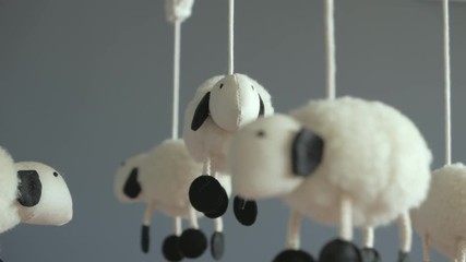 Mobile with sheep, spinning