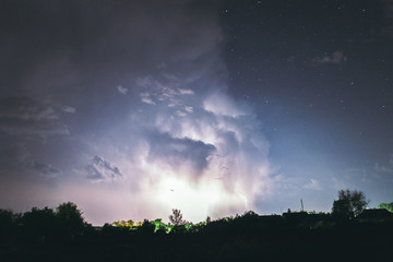 Obraz na płótnie Canvas Night summer thunderstorm in the countryside. Night landscape