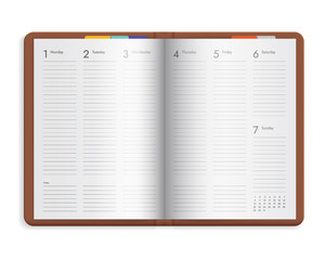 Open diary with weekly calendar in brown hardcover