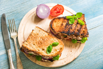 Healthy delicious homemade sandwiches with vegetables, ham and cheese