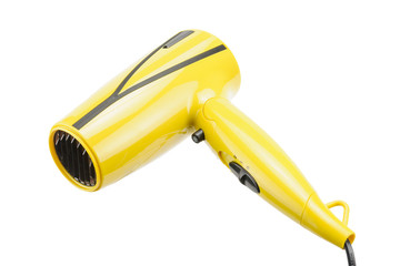 Yellow foldable hair dryer isolated on the white background