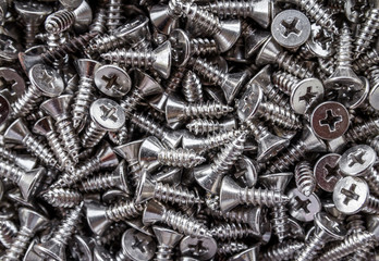 Closeup of steel screws background