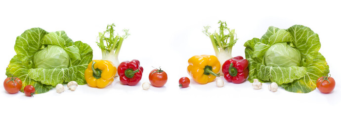 Panoramic view of a Green cabbage. Yellow pepper. Red tomatoes and cucumbers on a white background.