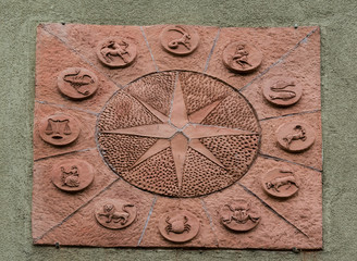 terracotta tile with the twelve signs of the zodiac
