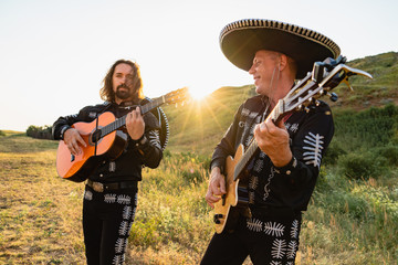 Mexican musicians mariachi outdoor. 
