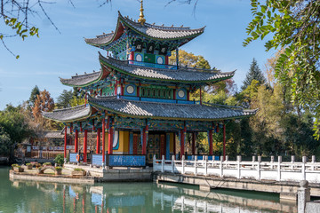 Fototapeta premium Lijiang old town,China. scene-Black Dragon Pool Park. . In the there, you can see Jade Dragon Snow Mountain.