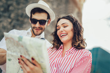 Tourist couple enjoying sightseeing and exploring city
