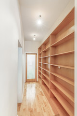 Empty shelves in a stoage room