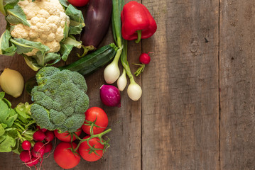 Fresh vegetables on wooden background. Top view, Copy space.