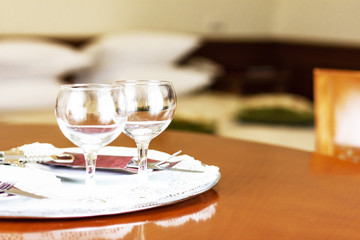 Empty wine glasses in the bedroom