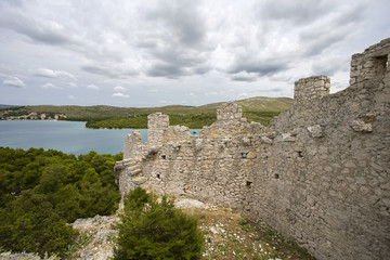 Fototapeta na wymiar Old wall near Sibenik. In history it was built as a protection against turkish army. 