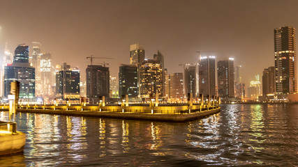 Fototapeta premium Dubai sky line at night from the creek