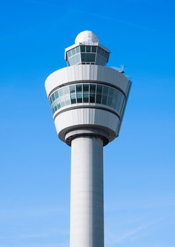 Flight control tower on blue sky background
