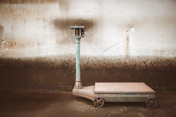 Old big rusty weighing scales