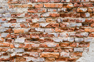 Cracked old orange bricks wall background