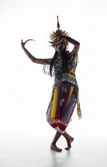 The lady in Southern thai classical dancing suit is posing on white background.