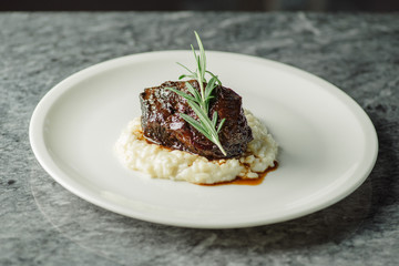 meat with rice and rosemary