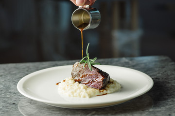 meat with rice and rosemary