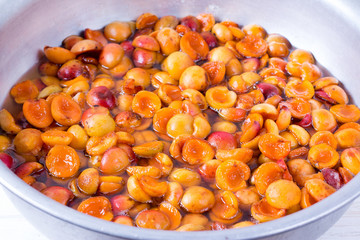Apricots with sugar for cooking jam