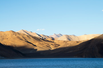 Pangong Tso is an endorheic lake in the Himalayas situated at a height of about 4,350 m. It is 134 km long and extends from India to Tibet in Ladakh, India