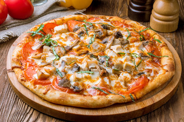 Pizza with chicken and mushrooms