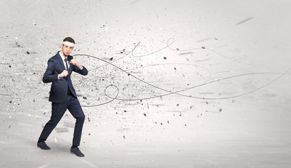 Young suited karate trainer doing karate tricks with chaotic concept  © ra2 studio