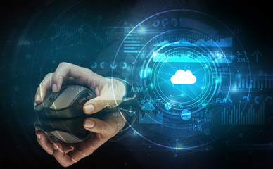Hand using wireless mouse with cloud technology concept and dark background