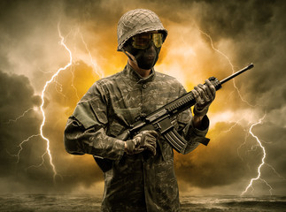 Armed soldier standing in rainy obscure weather
