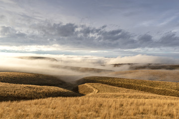 Fog and Winter Clouds over Eastern Washington rolling hills