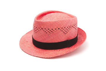 Red straw hat on a white background.