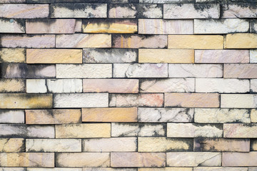 textured decorative orange brick wall. background