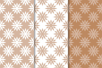 Brown floral backgrounds. Set of seamless patterns