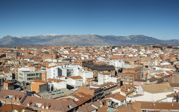 Views of the city of Colmenar Viejo, Madrid, Spain, from the belltower of the Basilica of La Asuncion de Nuestra Se&ntilde;ora. In the background, it can be seen Guadarrama Mountains Range